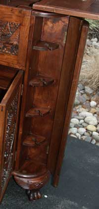 Hand carved bar glass racks after restoration